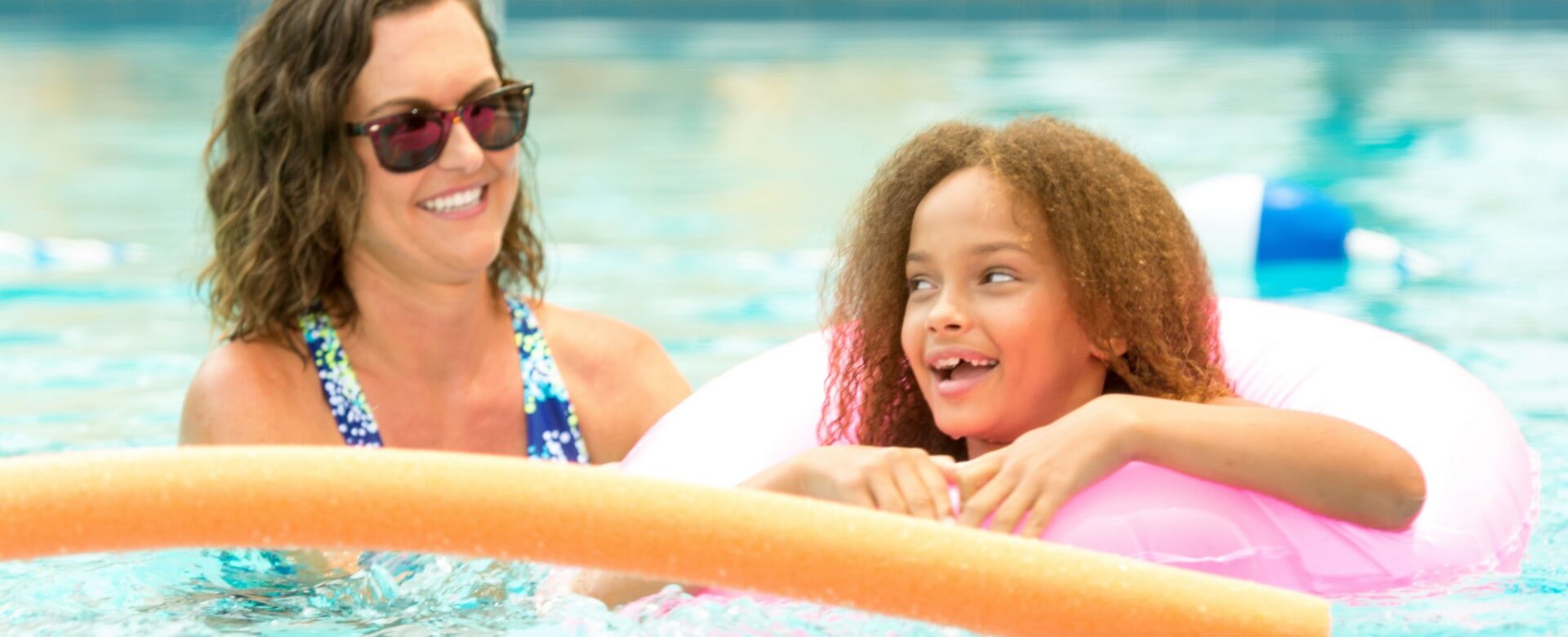 little girl in pool at St. Pete Shores Hotel