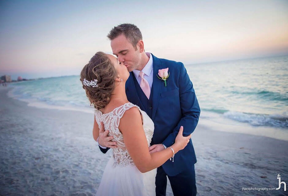 bride and groom on beach