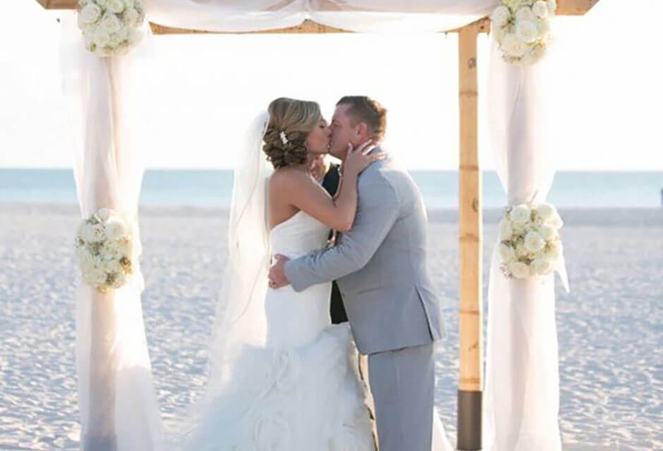 St. Pete Shores Hotel bride and groom under the altar