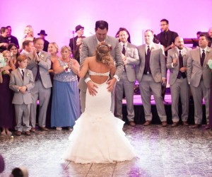 bride and grooms dancing