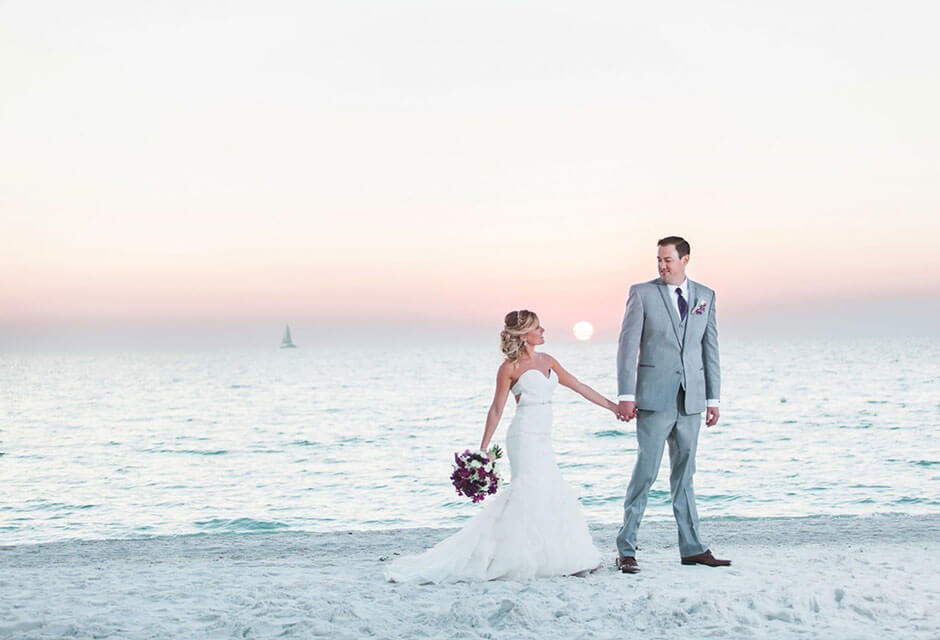 St. Pete Shores Hotel bride and groom on the beach sunset