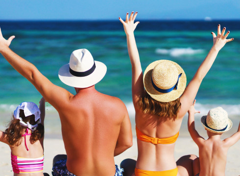 family enjoying the beach